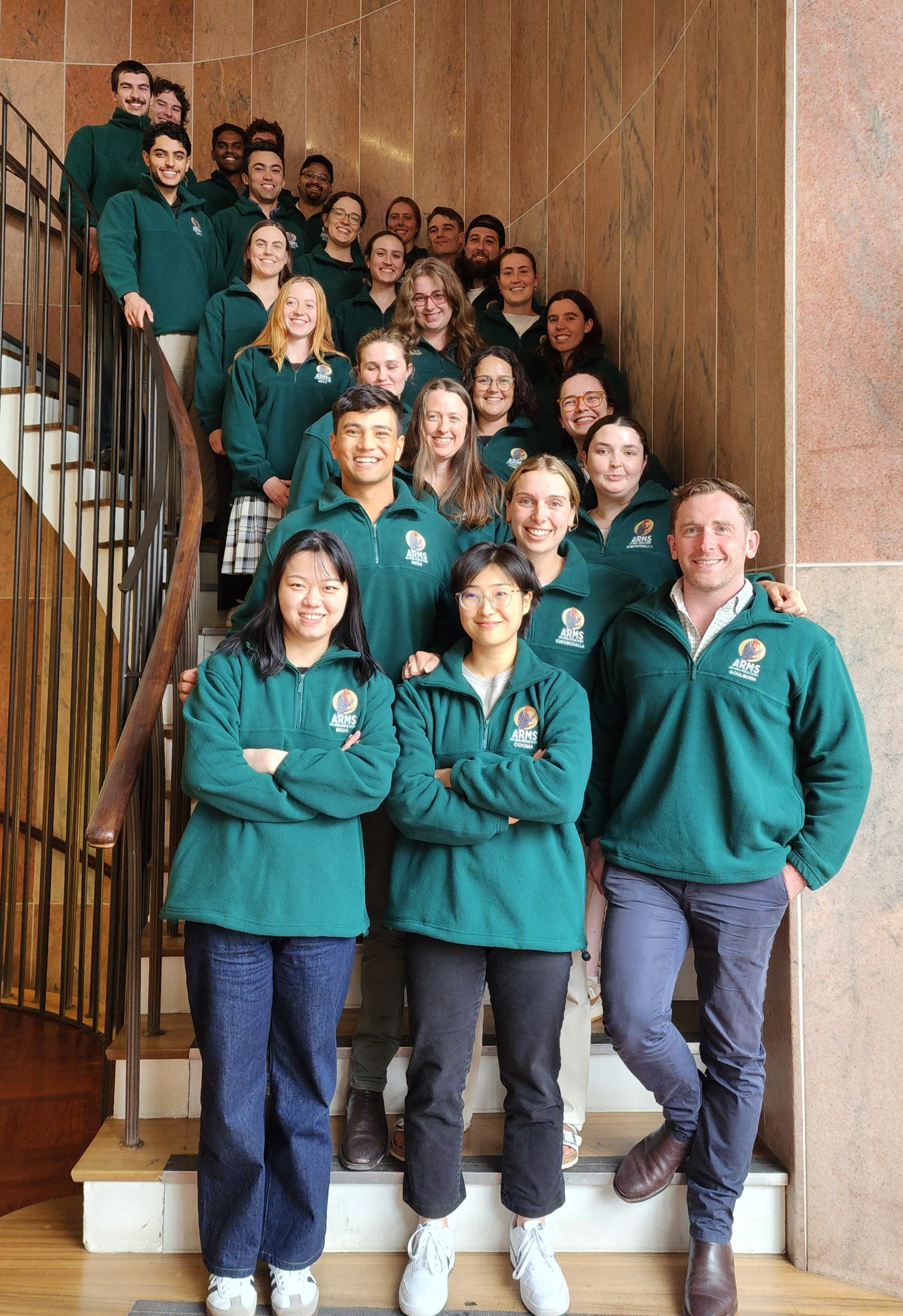 A group of people standing on stairs